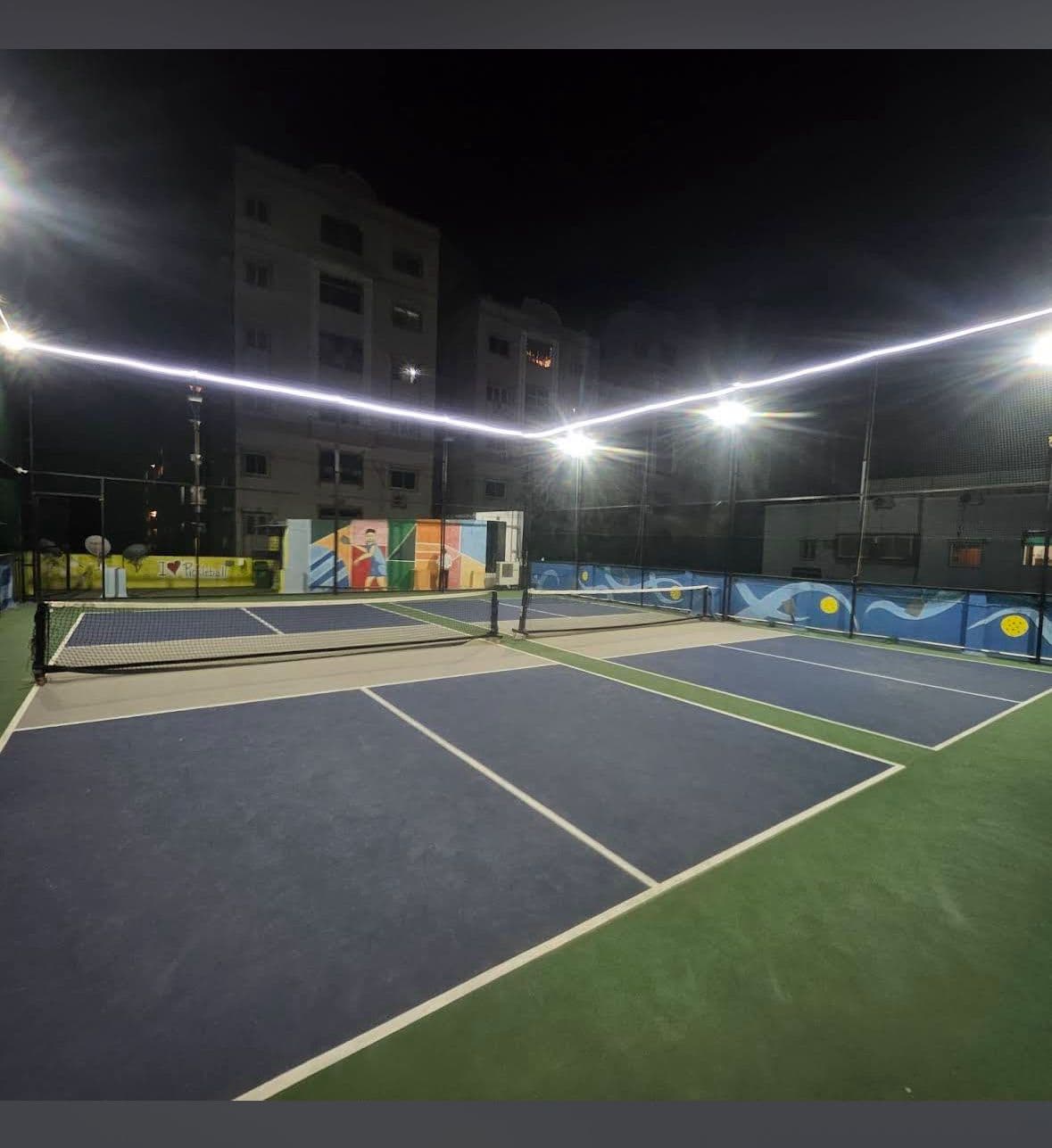 DINKRR courts at night with floodlights